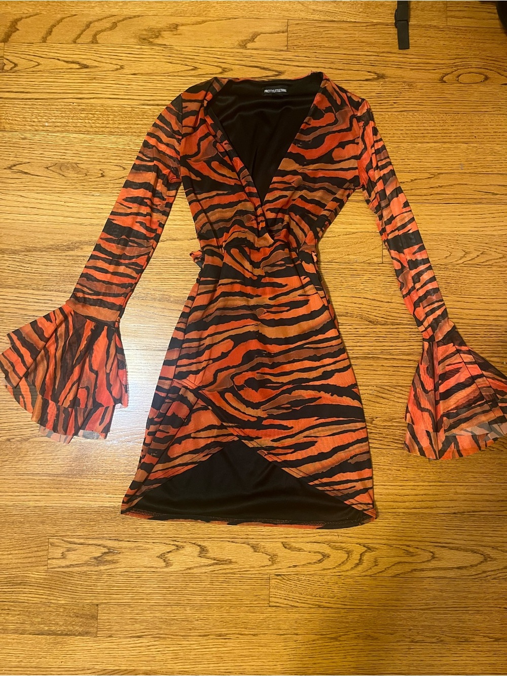 PrettyLittleThing Orange and Black Animal-Print Wrap Mini Dress